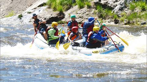 a group white water rafting