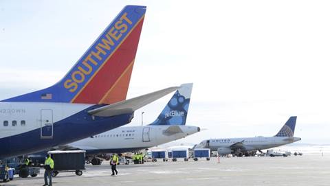 Southwest, Jetblue, and United planes on the tarmack.