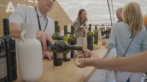 Food and Wine Fest pouring wine for guests