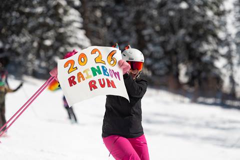 Rainbow Run skier with Rainbow Run poster 2026