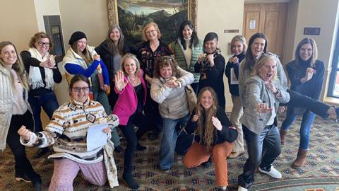 Womens+ Netowrk and community members attend an International Women's Day event with author Jennifer Cassetta.