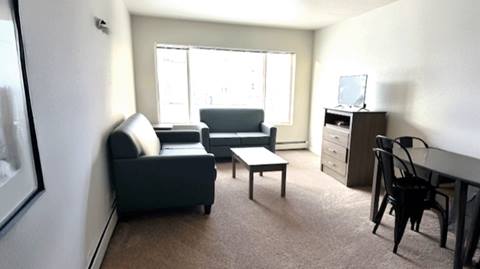 The living room inside an apartment for employee housing at Steamboat Resort.