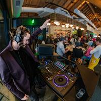 DJ playing tunes at The Range Food & Drink Hall at Steamboat Resort.