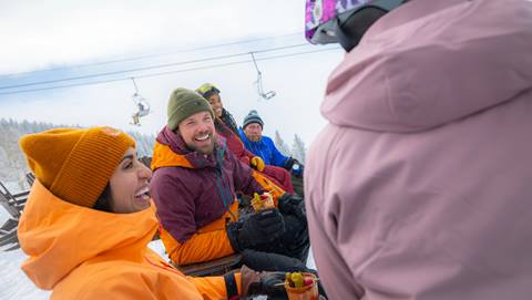 Three friends at Four Points Lodge.