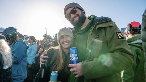 A couple enjoying a winter concert at the base of Steamboat Resort.