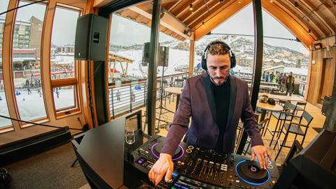 Dj inside The Range Food & Drink Hall at Steamboat Resort.