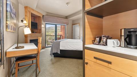 A Deluxe King hotel room at The Steamboat Grand.