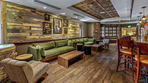 Soft seating inside the Crooked Antler restaurant at The Steamboat Grand.