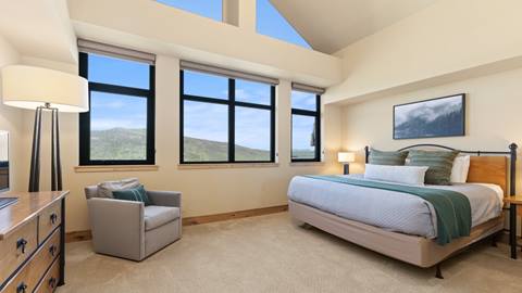 Bedroom of Penthouse 707 at The Steamboat Grand.