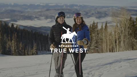 A couple skiing at Steamboat.
