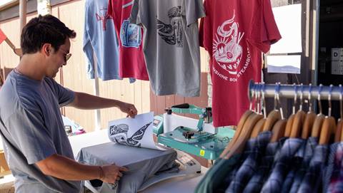 Custom t-shirt heat press at Steamboat Resort.