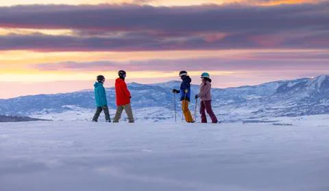four people night skiing at Steamboat Resort