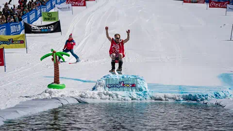 A skier going off a jump at Steamboat Resort's Pond Skim event.